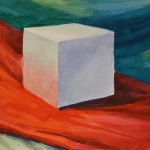 Still life with cube and fabric.